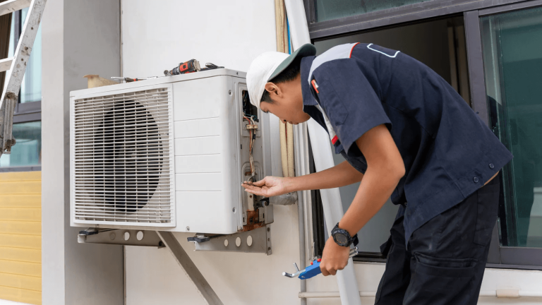 Self HVAC technician inspecting HVAC